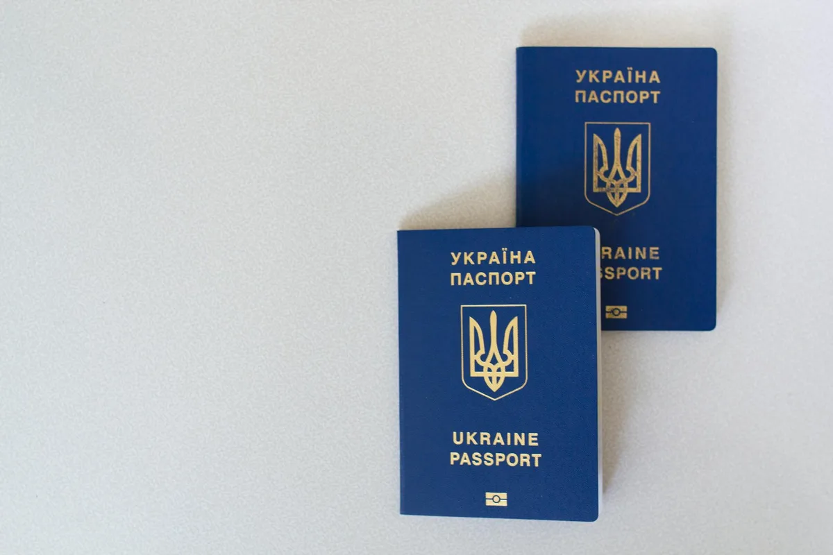 Office desk with passports and administrative documents, visa preparation atmosphere